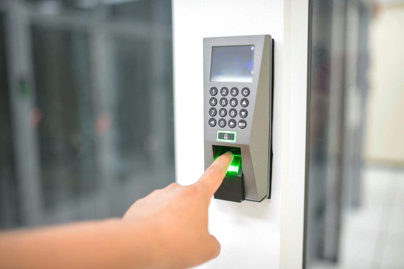 Fingerprint access control reader at an office entrance